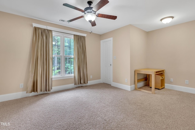 3004 Krogen Ct, Creedmoor, NC 27522 - spare room featuring a ceiling fan, carpet floors, and baseboards