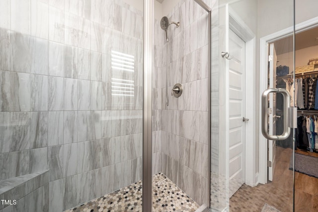 1705 Main Divide Dr, Wake Forest, NC 27587 - full bathroom with a tile shower and a walk in closet