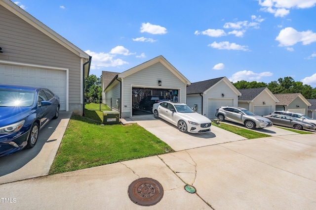 1705 Main Divide Dr, Wake Forest, NC 27587 - view of front facade with a front lawn and a garage