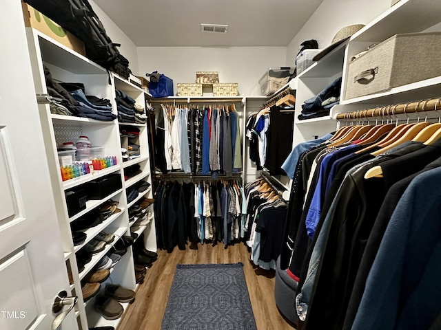 1705 Main Divide Dr, Wake Forest, NC 27587 - spacious closet with wood finished floors