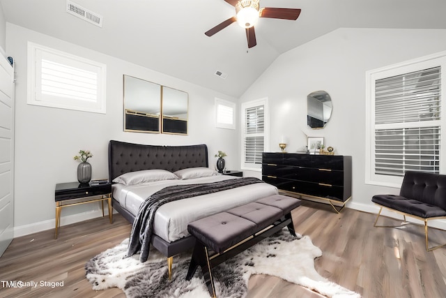 1705 Main Divide Dr, Wake Forest, NC 27587 - bedroom with lofted ceiling, wood finished floors, baseboards, and ceiling fan