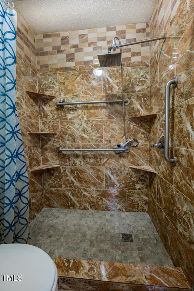 6767 Cedar Chest Ct, Fayetteville, NC 28314 - full bath featuring toilet, a tile shower, and a textured ceiling