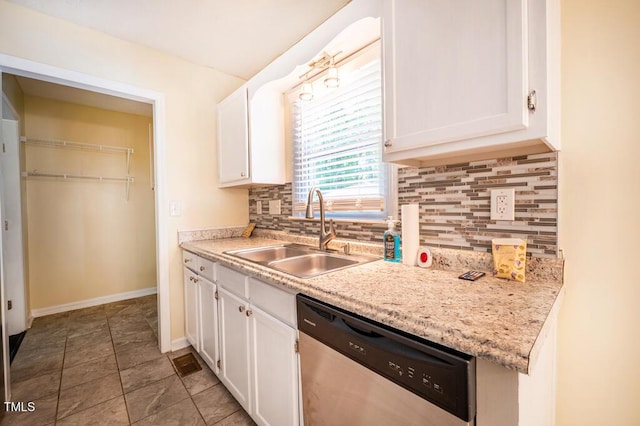 6767 Cedar Chest Ct, Fayetteville, NC 28314 - kitchen featuring dishwasher, a sink, white cabinets, and light countertops