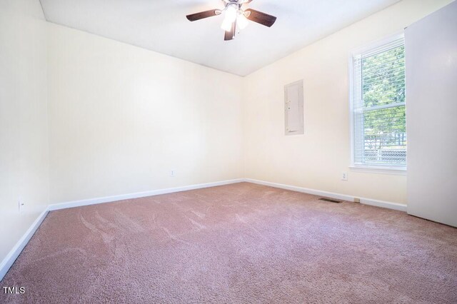6767 Cedar Chest Ct, Fayetteville, NC 28314 - carpeted spare room featuring electric panel, ceiling fan, and baseboards