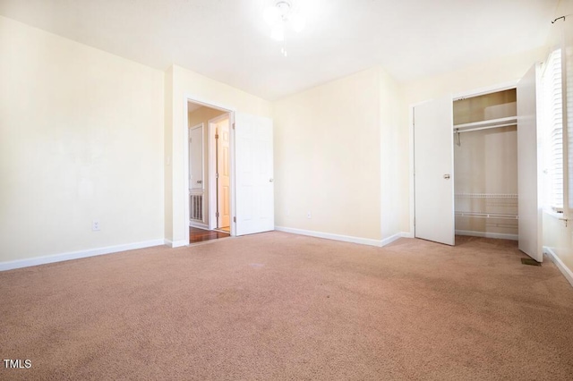 6767 Cedar Chest Ct, Fayetteville, NC 28314 - unfurnished bedroom with carpet flooring, baseboards, and a closet