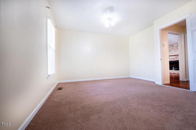 6767 Cedar Chest Ct, Fayetteville, NC 28314 - spare room with carpet floors and baseboards
