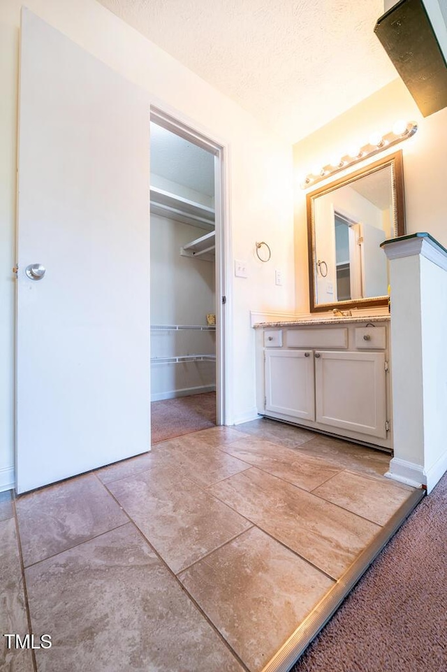 6767 Cedar Chest Ct, Fayetteville, NC 28314 - bathroom with vanity and baseboards
