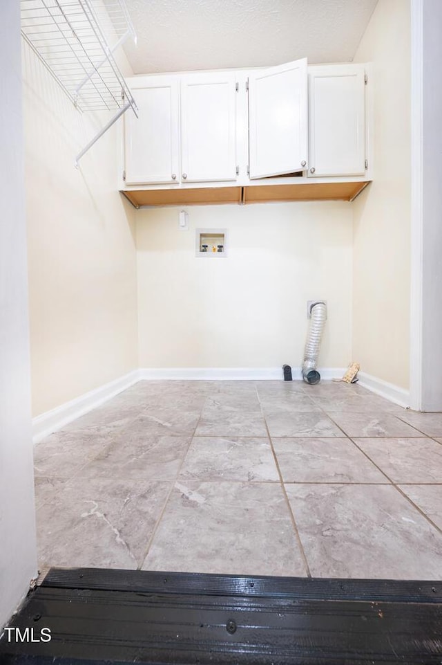 6767 Cedar Chest Ct, Fayetteville, NC 28314 - laundry room featuring cabinet space, hookup for a washing machine, and baseboards