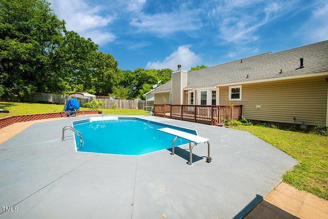 6767 Cedar Chest Ct, Fayetteville, NC 28314 - view of swimming pool with a patio, a deck, and a diving board