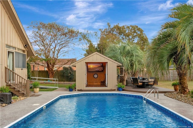 103 Kensington St, Lumberton, NC 28358 - view of swimming pool featuring an outdoor structure and a patio area