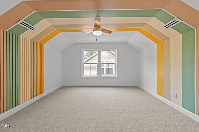 904 Pirouette Ct, Raleigh, NC 27606 - additional living space featuring carpet, a ceiling fan, vaulted ceiling, and baseboards