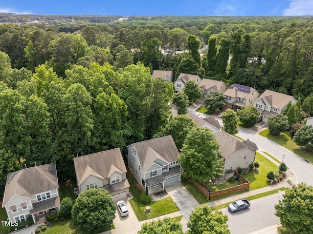 904 Pirouette Ct, Raleigh, NC 27606 - aerial view of residential area featuring a heavily wooded area