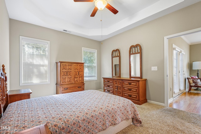 127 Bobwhite Way, Mebane, NC 27302 - bedroom with light carpet, baseboards, and a ceiling fan