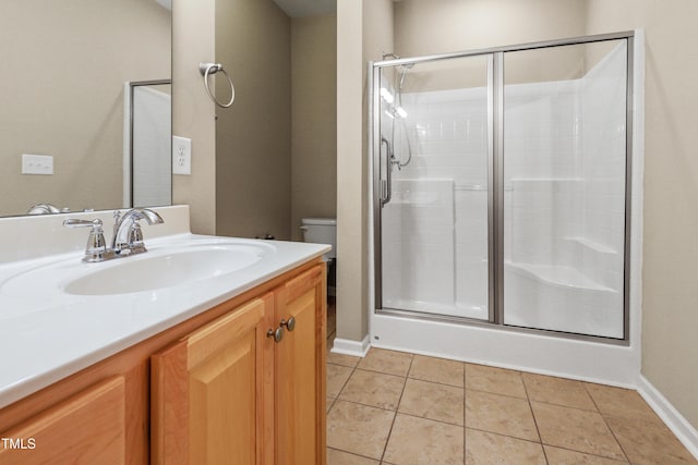 127 Bobwhite Way, Mebane, NC 27302 - bathroom with a stall shower, toilet, vanity, and baseboards