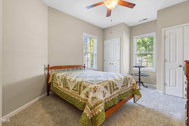 127 Bobwhite Way, Mebane, NC 27302 - bedroom with carpet floors, baseboards, and multiple closets