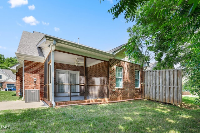 127 Bobwhite Way, Mebane, NC 27302 - rear view of property with brick siding, a ceiling fan, a yard, cooling unit, and roof with shingles
