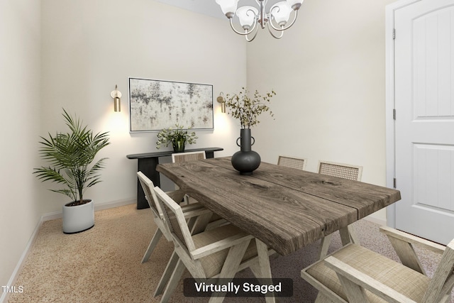127 Bobwhite Way, Mebane, NC 27302 - dining space featuring a chandelier, baseboards, and dark speckled floor