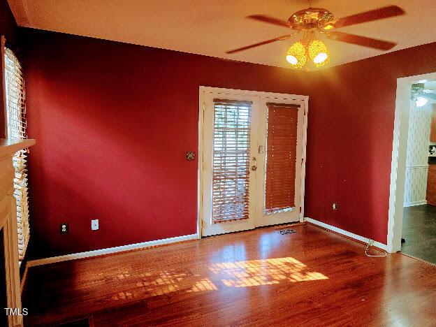 5301 Peacenest Dr, Raleigh, NC 27610 - unfurnished room with ceiling fan, wood finished floors, and baseboards