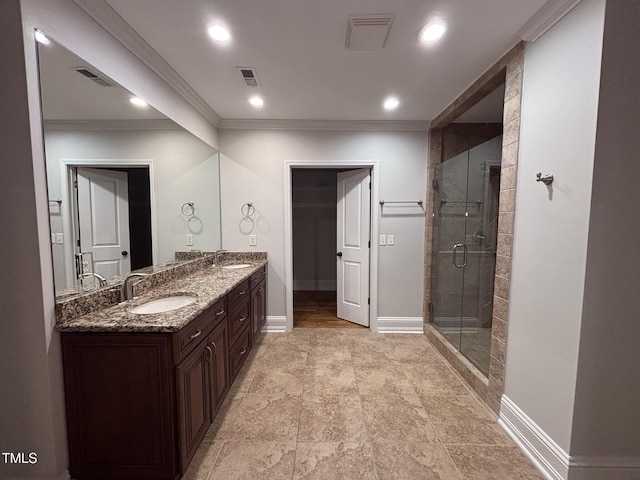 119 W Vernon Ave, Wake Forest, NC 27587 - bathroom featuring double vanity, ornamental molding, a stall shower, baseboards, and recessed lighting
