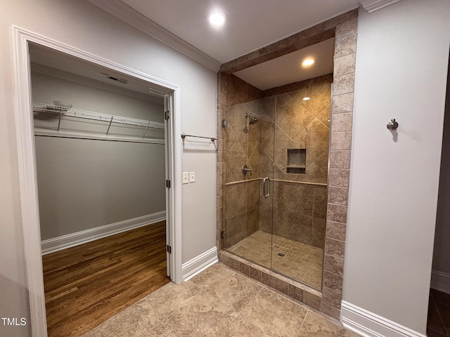 119 W Vernon Ave, Wake Forest, NC 27587 - full bathroom featuring a stall shower, a spacious closet, baseboards, and recessed lighting