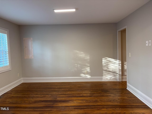 119 W Vernon Ave, Wake Forest, NC 27587 - empty room with dark wood-style flooring and baseboards