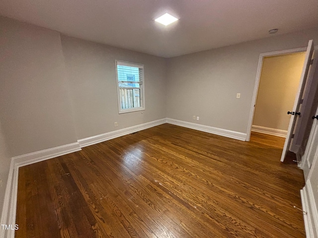 119 W Vernon Ave, Wake Forest, NC 27587 - spare room featuring dark wood finished floors and baseboards