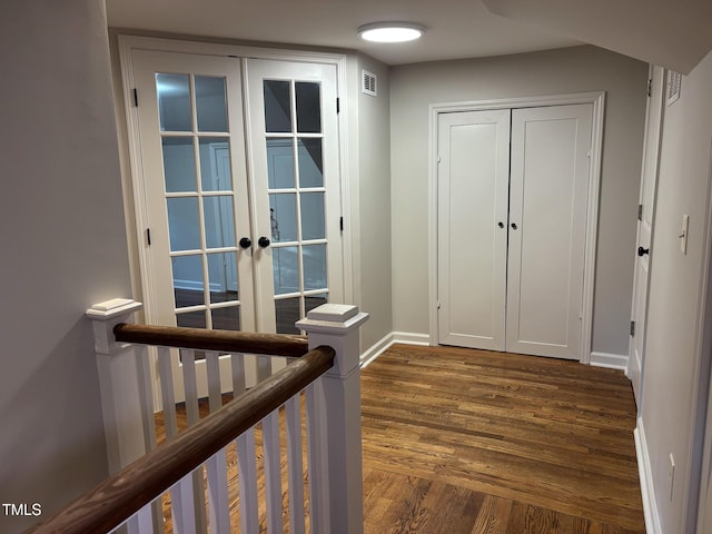 119 W Vernon Ave, Wake Forest, NC 27587 - hall with dark wood-style floors, french doors, and baseboards