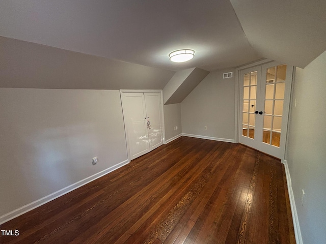 119 W Vernon Ave, Wake Forest, NC 27587 - bonus room featuring french doors, lofted ceiling, dark wood-style floors, and baseboards