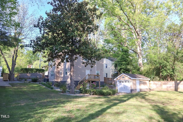 119 W Vernon Ave, Wake Forest, NC 27587 - view of yard with a garage and an outbuilding