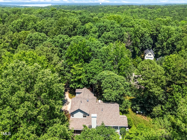 7401 Heartland Dr, Wake Forest, NC 27587 - view of subject property featuring a heavily wooded area