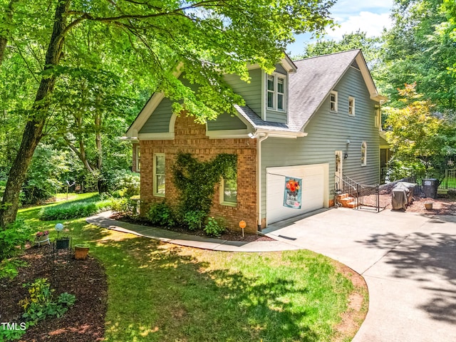 7401 Heartland Dr, Wake Forest, NC 27587 - view of side of home with concrete driveway, a garage, brick siding, and a shingled roof