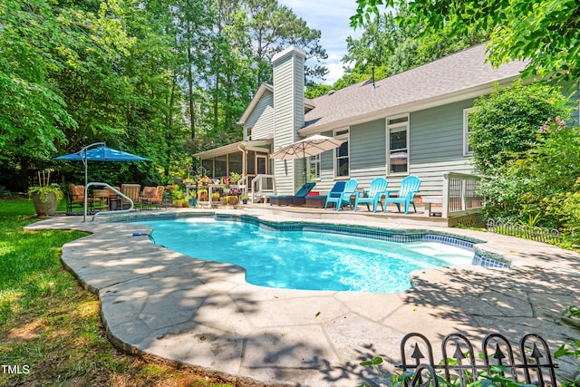 7401 Heartland Dr, Wake Forest, NC 27587 - view of swimming pool featuring a sunroom and a patio area