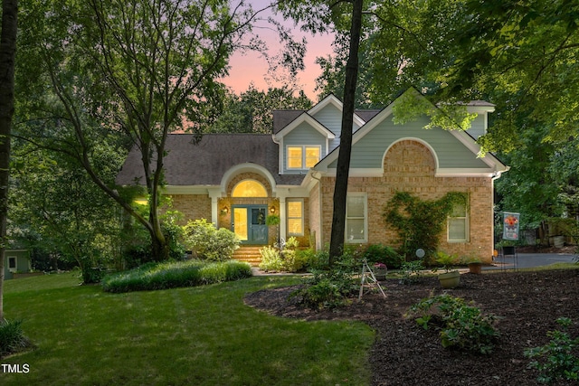 7401 Heartland Dr, Wake Forest, NC 27587 - traditional home featuring brick siding and a front yard