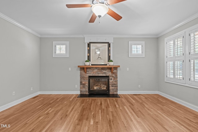 297 Curragh Cv, Fuquay Varina, NC 27526 - unfurnished living room with crown molding, light wood-type flooring, a fireplace, baseboards, and ceiling fan