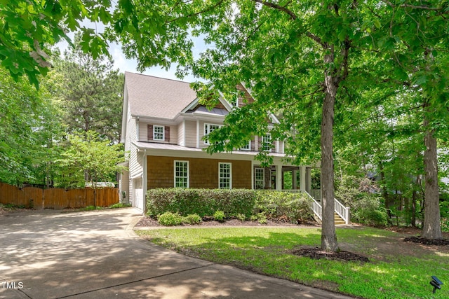 297 Curragh Cv, Fuquay Varina, NC 27526 - view of front of property with concrete driveway, a garage, and a shingled roof