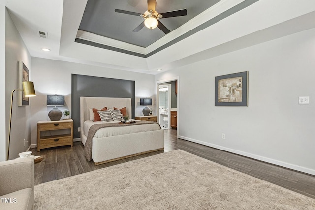 825 Highwater Pl, Fuquay Varina, NC 27526 - bedroom featuring wood finished floors, a tray ceiling, recessed lighting, crown molding, and a ceiling fan