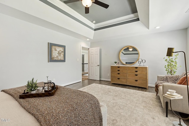 825 Highwater Pl, Fuquay Varina, NC 27526 - bedroom with wood finished floors, crown molding, recessed lighting, a raised ceiling, and ceiling fan