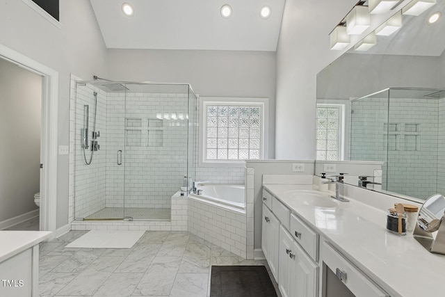 825 Highwater Pl, Fuquay Varina, NC 27526 - full bath with vanity, a bath, a stall shower, recessed lighting, and marble look tile flooring