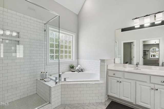 825 Highwater Pl, Fuquay Varina, NC 27526 - full bathroom with a stall shower, vanity, a bath, marble finish flooring, and vaulted ceiling