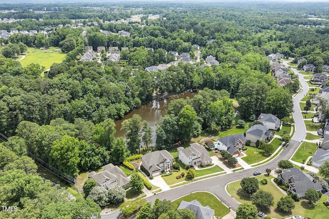 825 Highwater Pl, Fuquay Varina, NC 27526 - aerial perspective of suburban area with a nearby body of water and a heavily wooded area