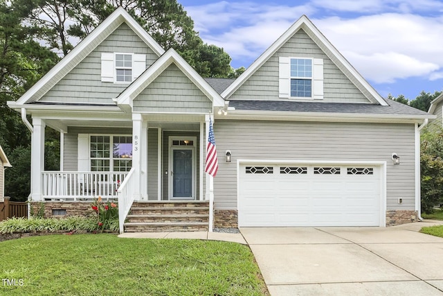 853 Bluffcreek Dr, Fuquay Varina, NC 27526 - craftsman inspired home with driveway, covered porch, a front lawn, and roof with shingles