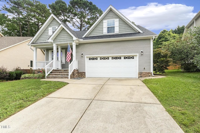 853 Bluffcreek Dr, Fuquay Varina, NC 27526 - view of front facade with covered porch, concrete driveway, a front yard, and a shingled roof