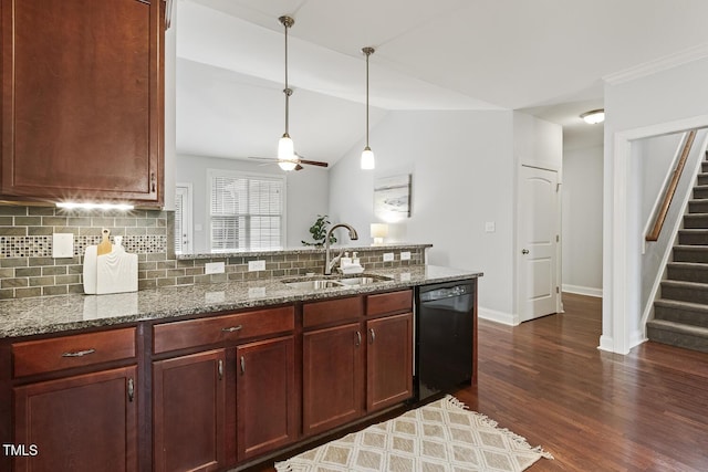 853 Bluffcreek Dr, Fuquay Varina, NC 27526 - kitchen with black dishwasher, a peninsula, tasteful backsplash, dark wood finished floors, and ceiling fan