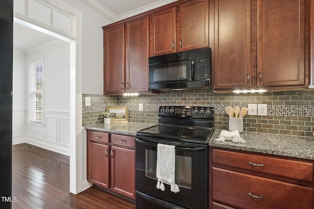 853 Bluffcreek Dr, Fuquay Varina, NC 27526 - kitchen featuring black appliances, crown molding, light stone counters, dark wood finished floors, and tasteful backsplash