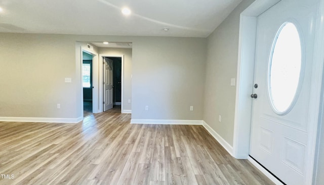 505 E Canary St, Dunn, NC 28334 - entrance foyer featuring light wood-style flooring, baseboards, and recessed lighting