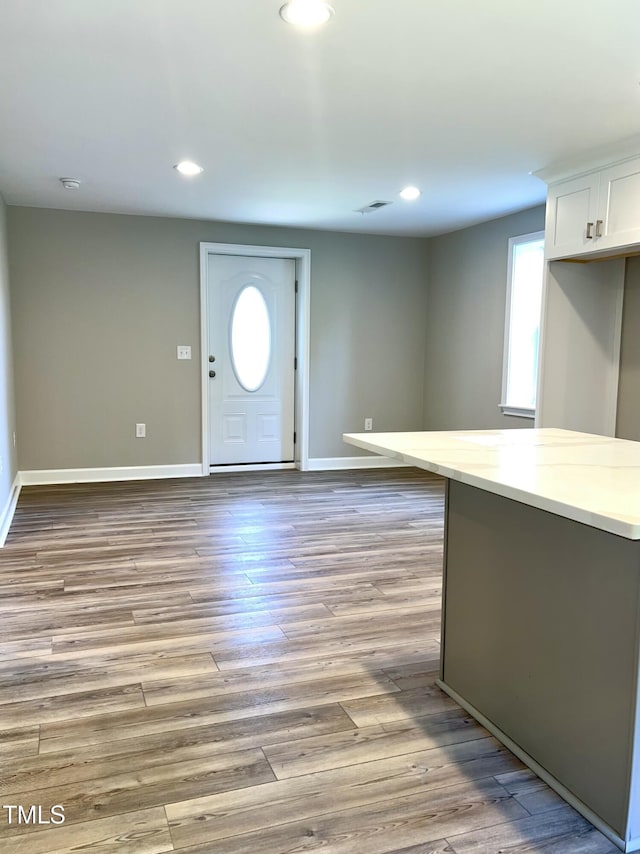 505 E Canary St, Dunn, NC 28334 - foyer with baseboards, recessed lighting, and light wood-style flooring