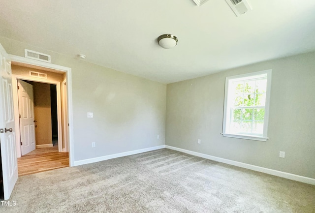 505 E Canary St, Dunn, NC 28334 - unfurnished room featuring baseboards and carpet floors