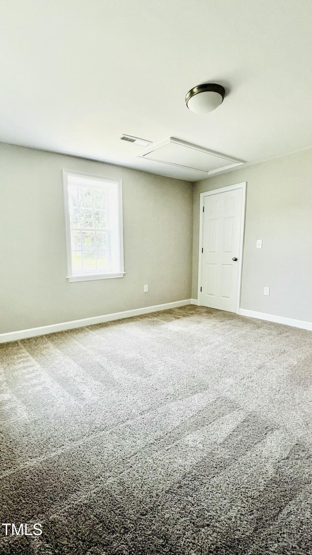 505 E Canary St, Dunn, NC 28334 - carpeted empty room featuring baseboards