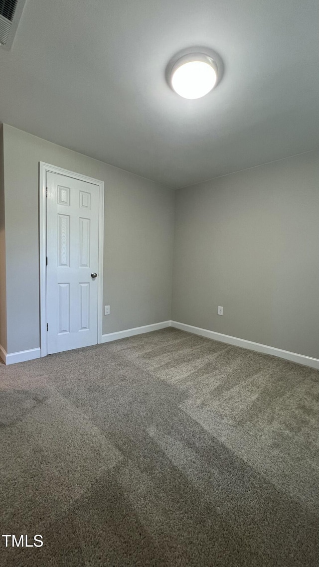 505 E Canary St, Dunn, NC 28334 - spare room with carpet flooring and baseboards