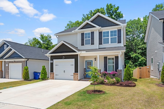445 Sturgeon St, Smithfield, NC 27577 - craftsman-style home featuring board and batten siding, driveway, covered porch, and brick siding